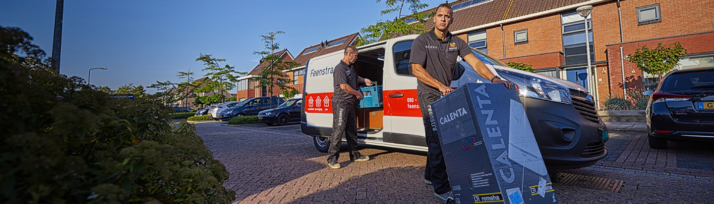 Banner monteur met steekwagen en Calenta ketel